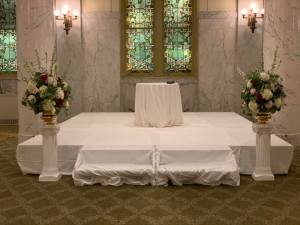 $159 ea - ceremony flowers on rental columns