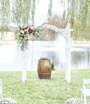 $145 - ceremony arch corner swag on venue’s arch